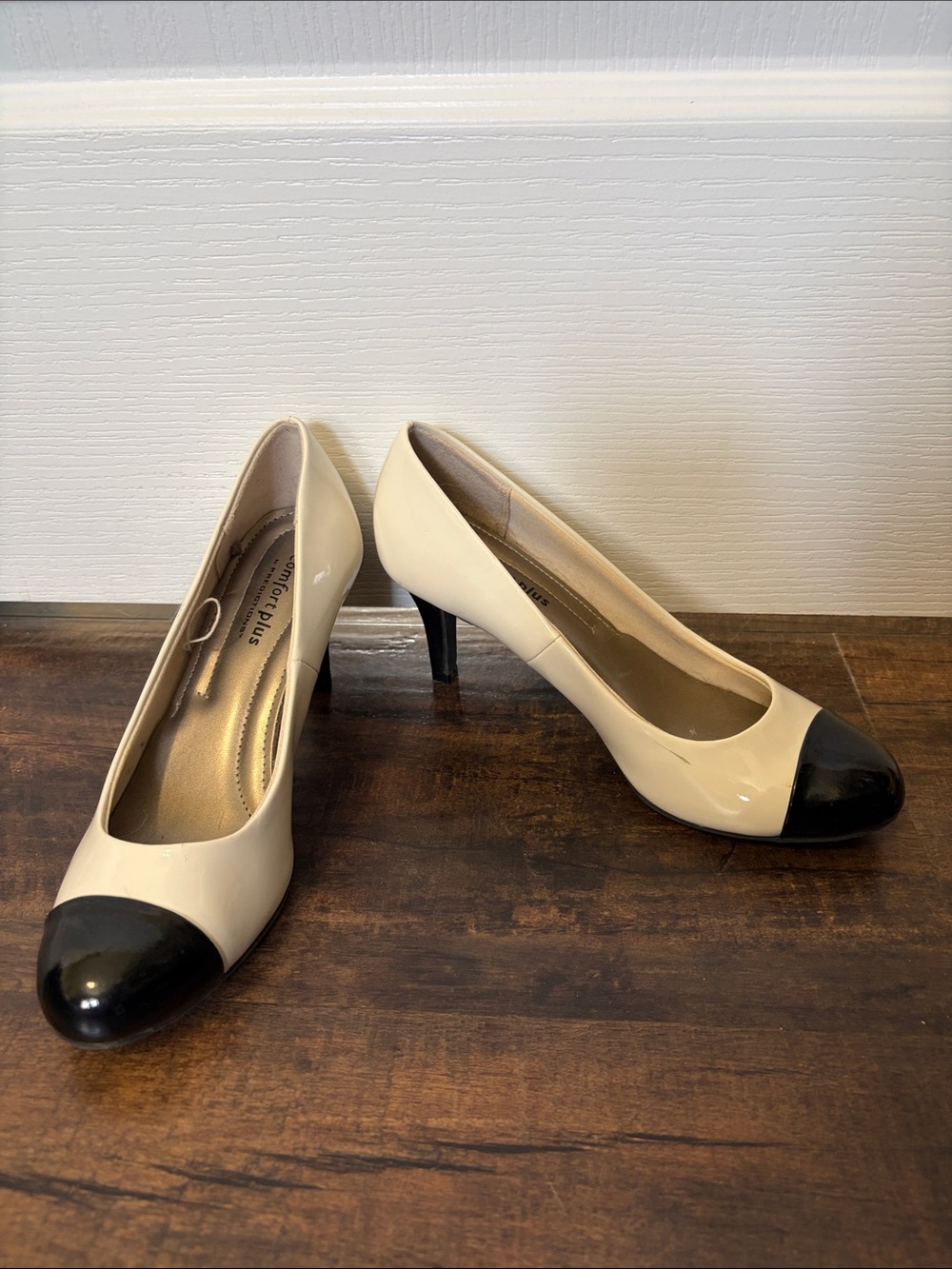 Classic Two-Tone White and Black Cap-Toe Pumps